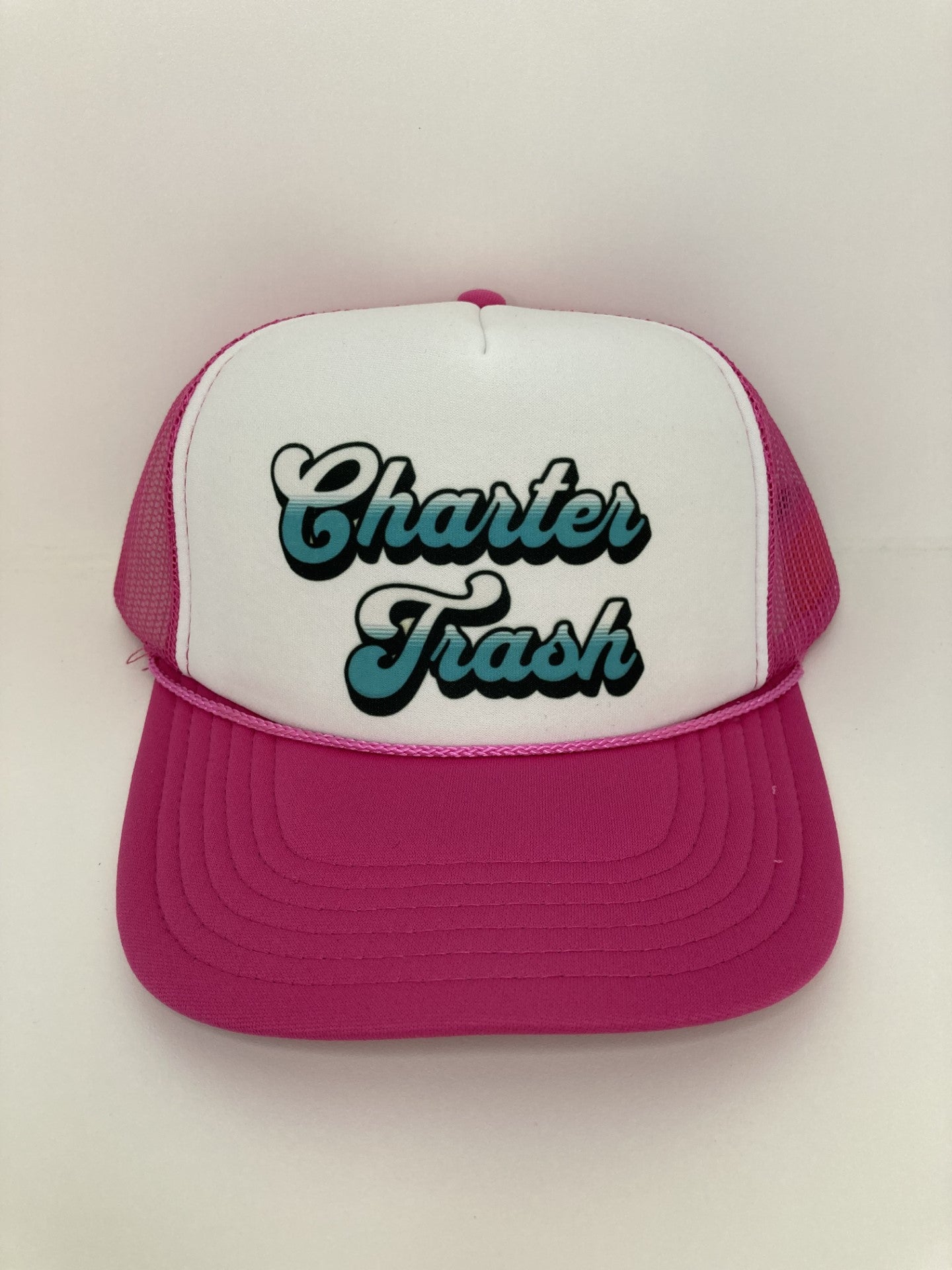 Pink & white foam front, trucker rope hat with Charter Trash text.